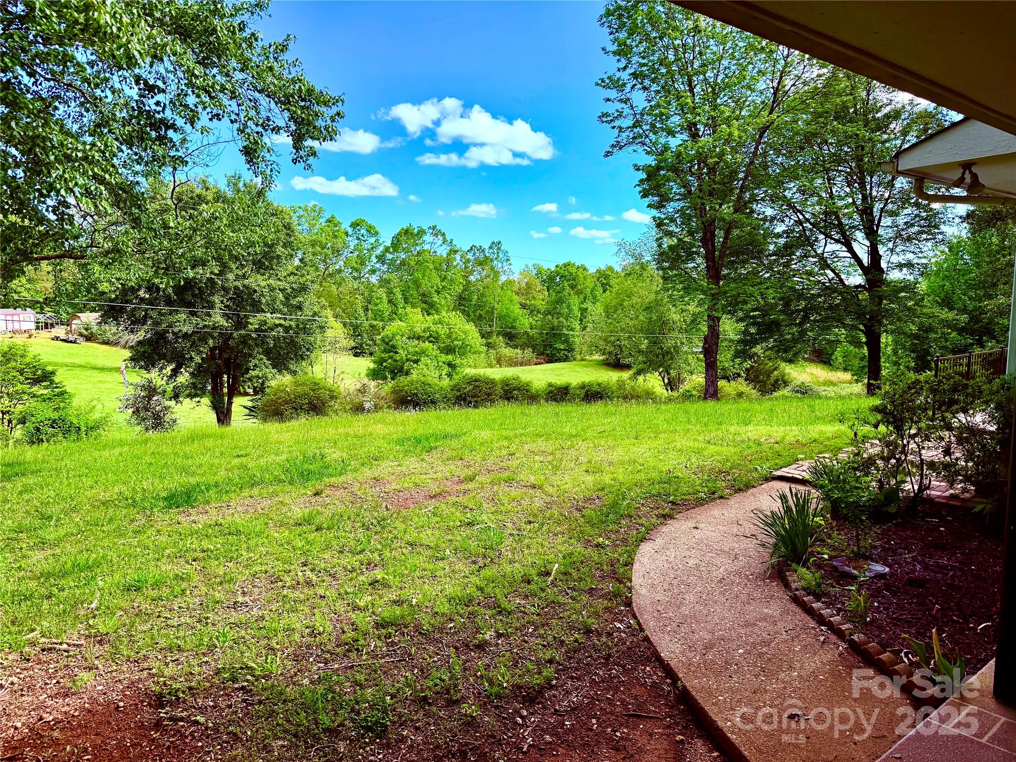 541 Romine Drive Marion, NC 28752 - Photo 23 of 23 a view of an outdoor space with a garden