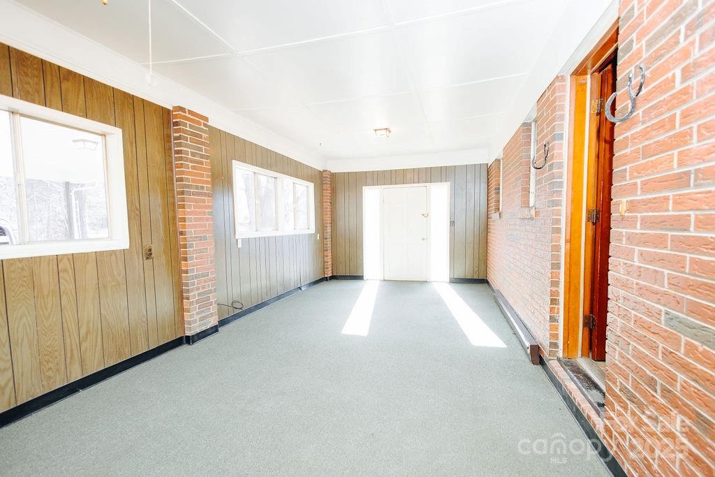 541 Romine Drive Marion, NC 28752 - Photo 7 of 23 a view of an empty room with a window