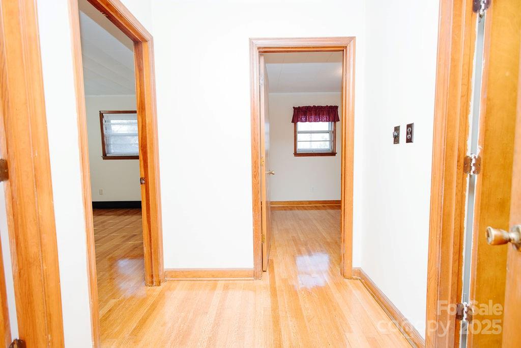 541 Romine Drive Marion, NC 28752 - Photo 10 of 23 a view of a bathroom from a hallway