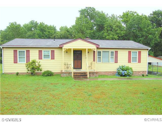 17401 Elko Road Petersburg, VA 23803 - Photo 1 of 12 a front view of a house with a yard