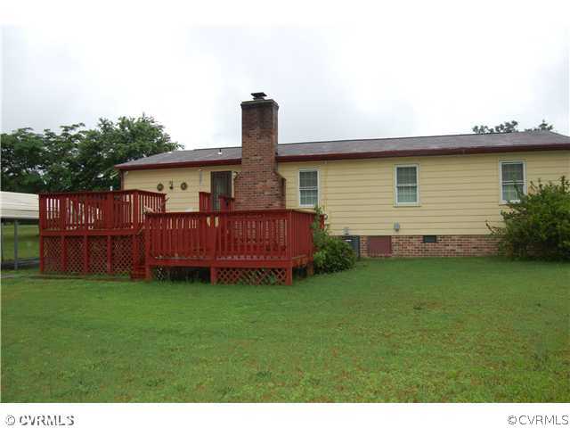 17401 Elko Road Petersburg, VA 23803 - Photo 2 of 12 a view of a house with a yard and deck