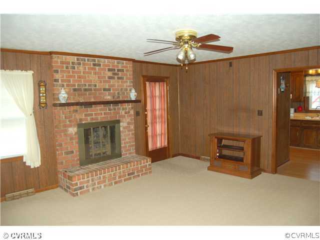 17401 Elko Road Petersburg, VA 23803 - Photo 3 of 12 a view of livingroom with fireplace