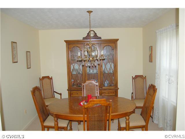 17401 Elko Road Petersburg, VA 23803 - Photo 6 of 12 a dining room with furniture and window