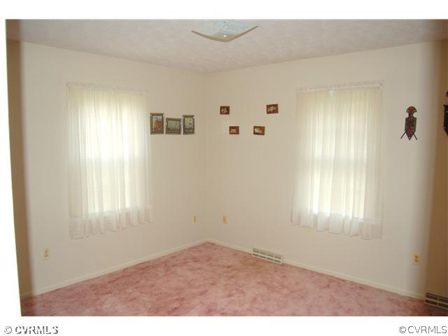 17401 Elko Road Petersburg, VA 23803 - Photo 8 of 12 a view of an empty room and window