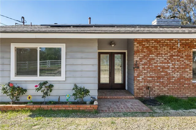 a view of a house with sitting area