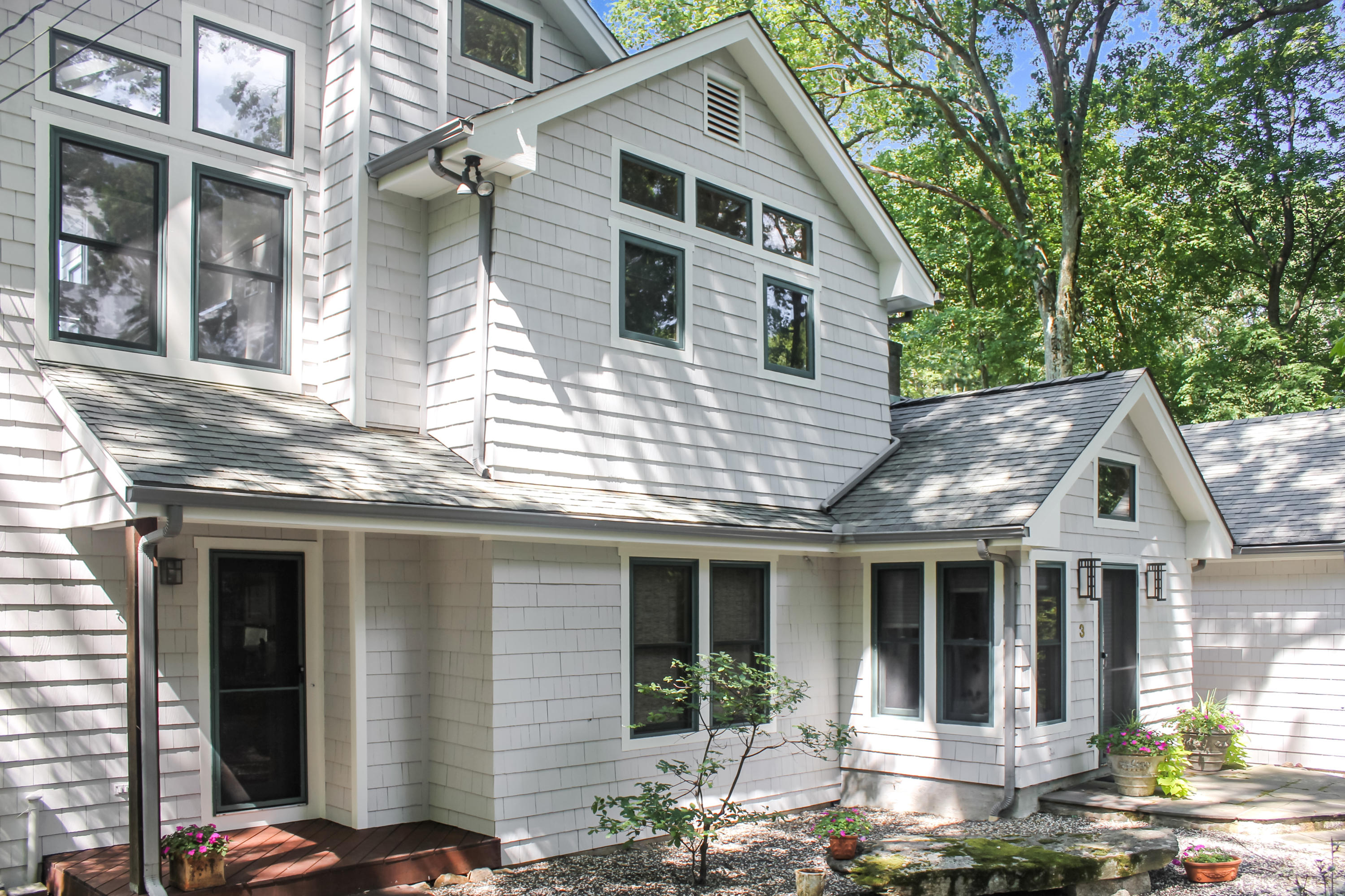 3 Little Brook Road Rowayton, CT 06853 - Photo 13 of 17 a front view of a house with a yard