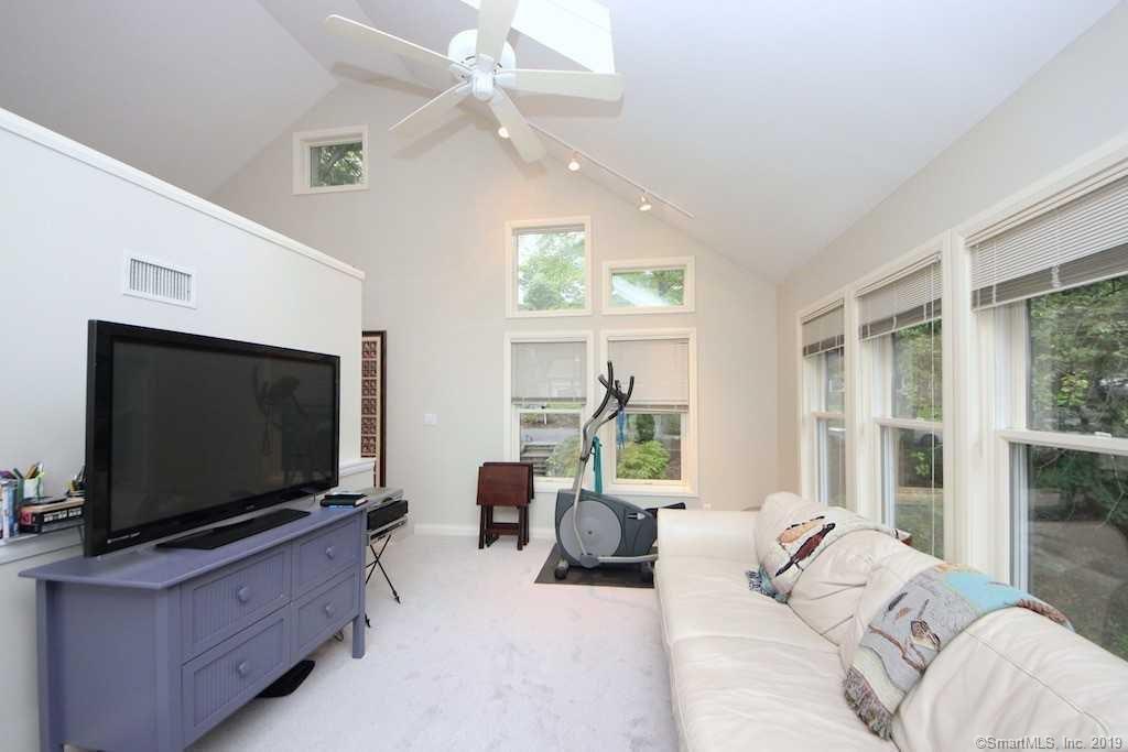 3 Little Brook Road Rowayton, CT 06853 - Photo 7 of 17 a living room with furniture and a flat screen tv