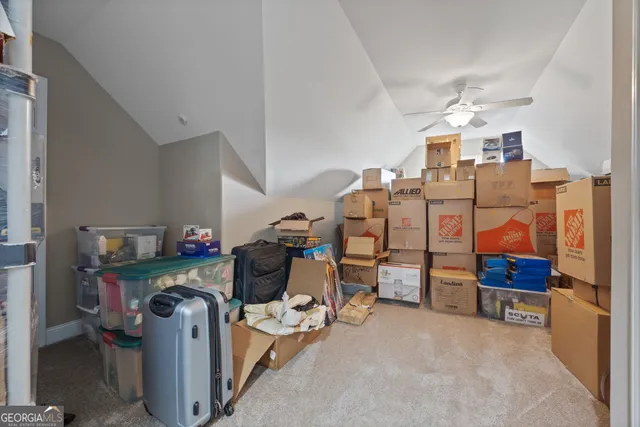 a house view with swimming pool in front of it