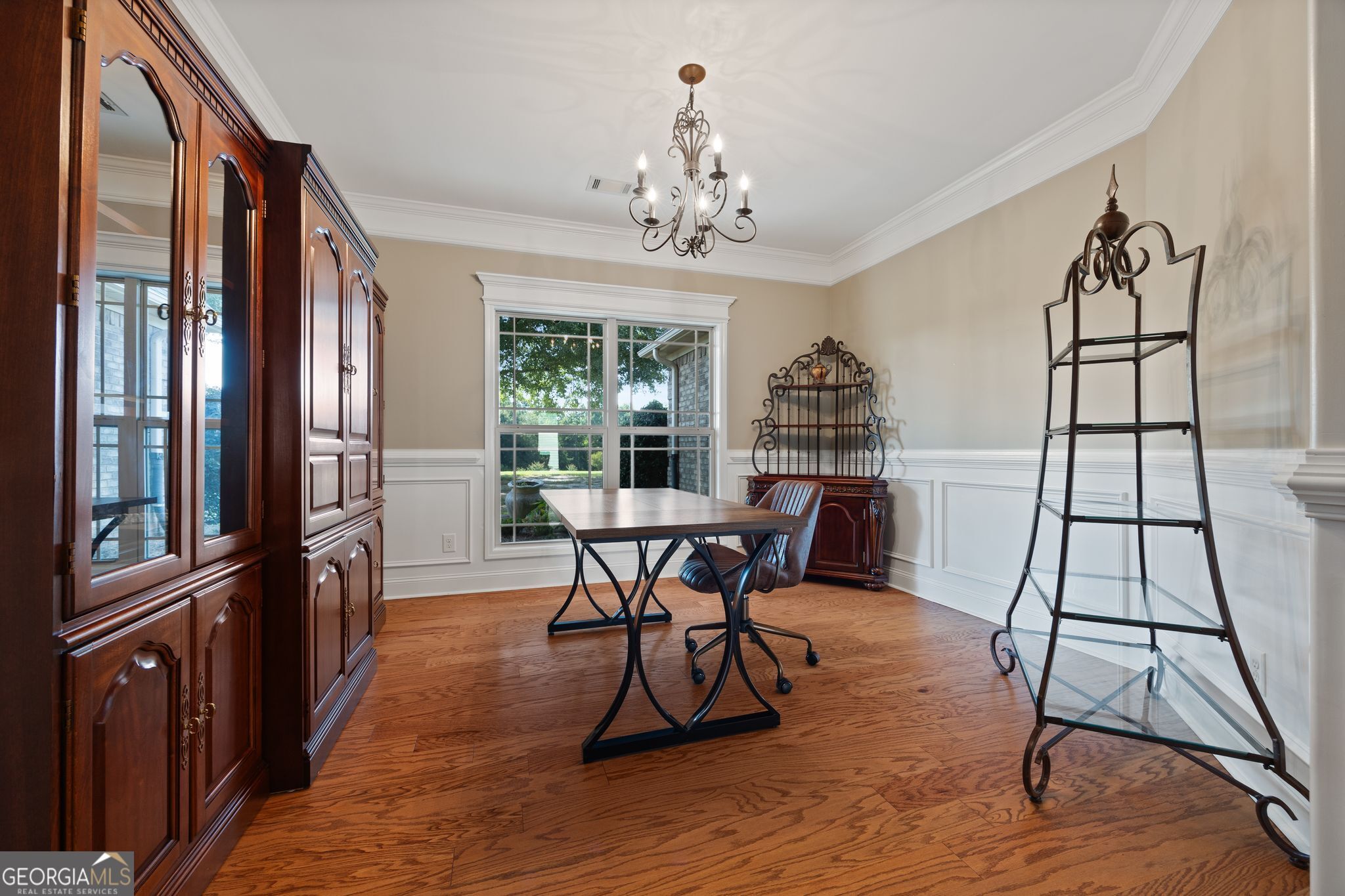 107 Sweet Bay Circle Milner, GA 30257 - Photo 5 of 31 a view of a dining room with furniture window and wooden floor