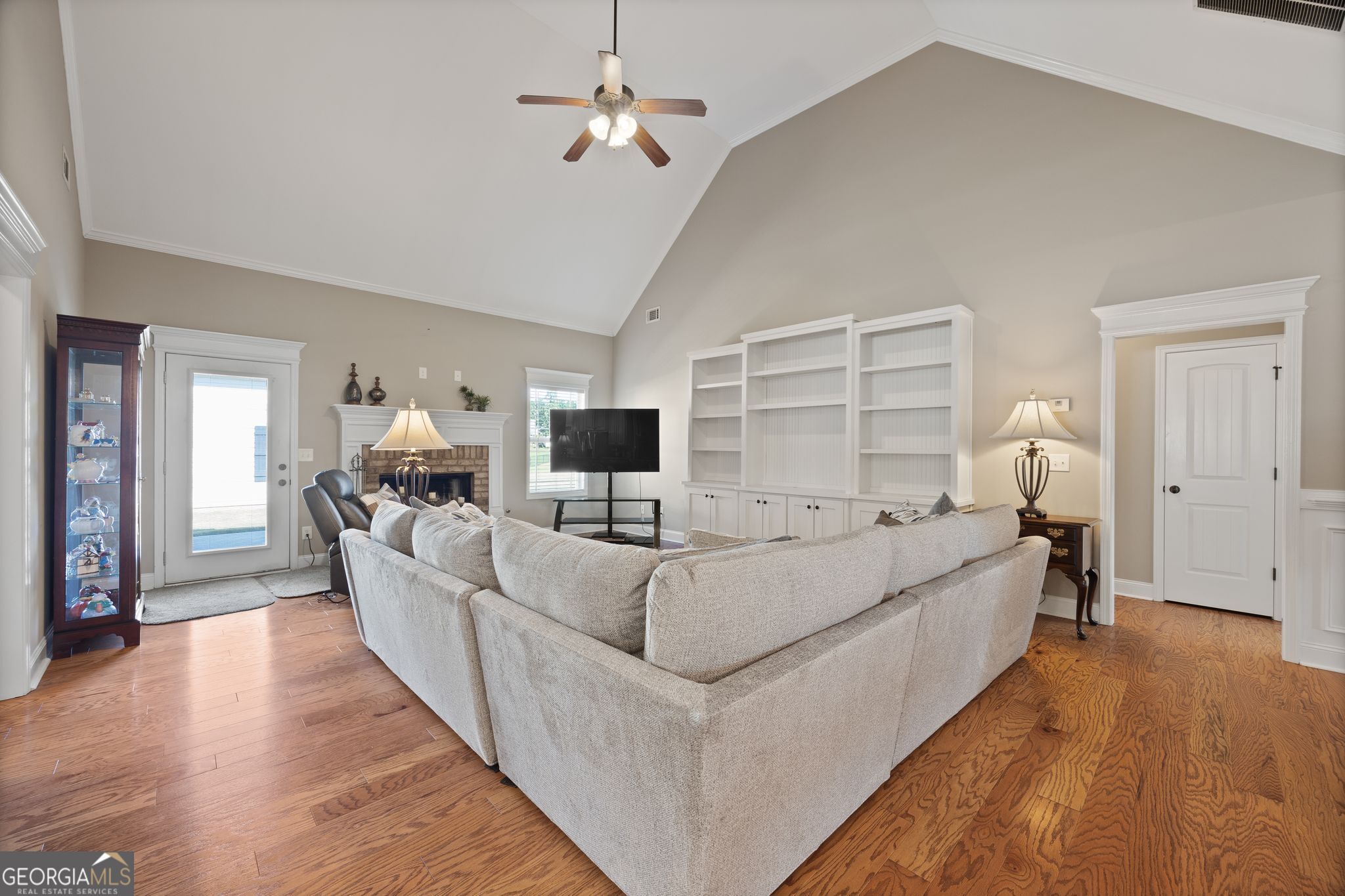 107 Sweet Bay Circle Milner, GA 30257 - Photo 6 of 31 a living room with furniture and a flat screen tv