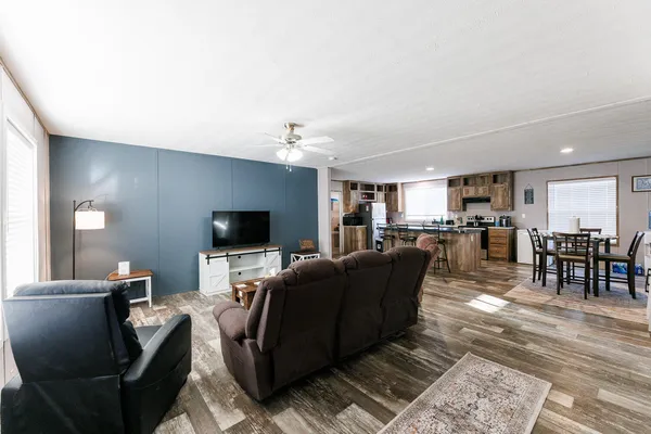 a bathroom with a sink vanity and a mirror
