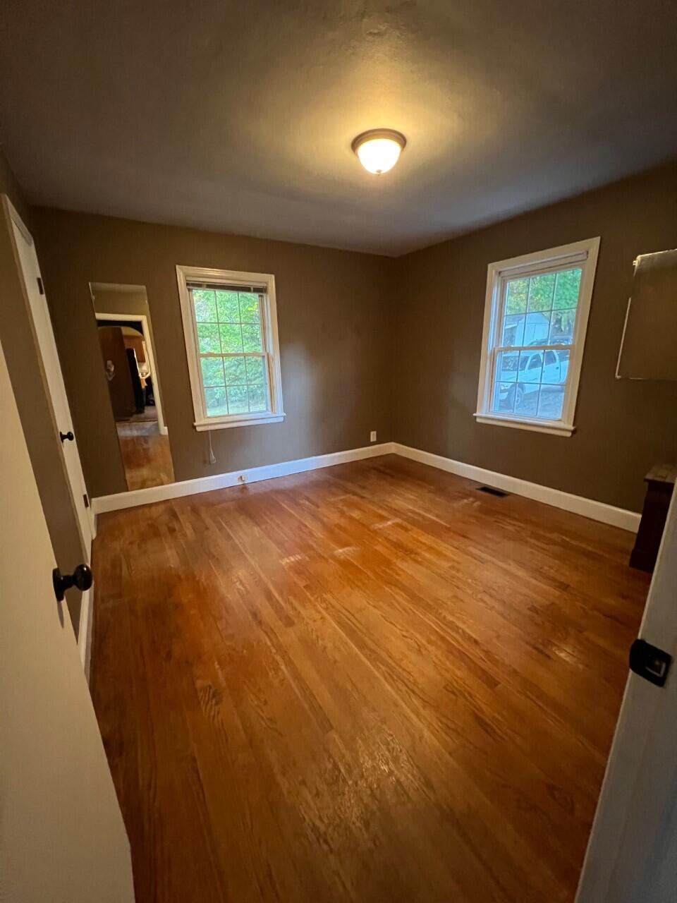 1523 Bore Auger Road Blue Ridge, VA 24064 - Photo 12 of 34 a view of an empty room with a window