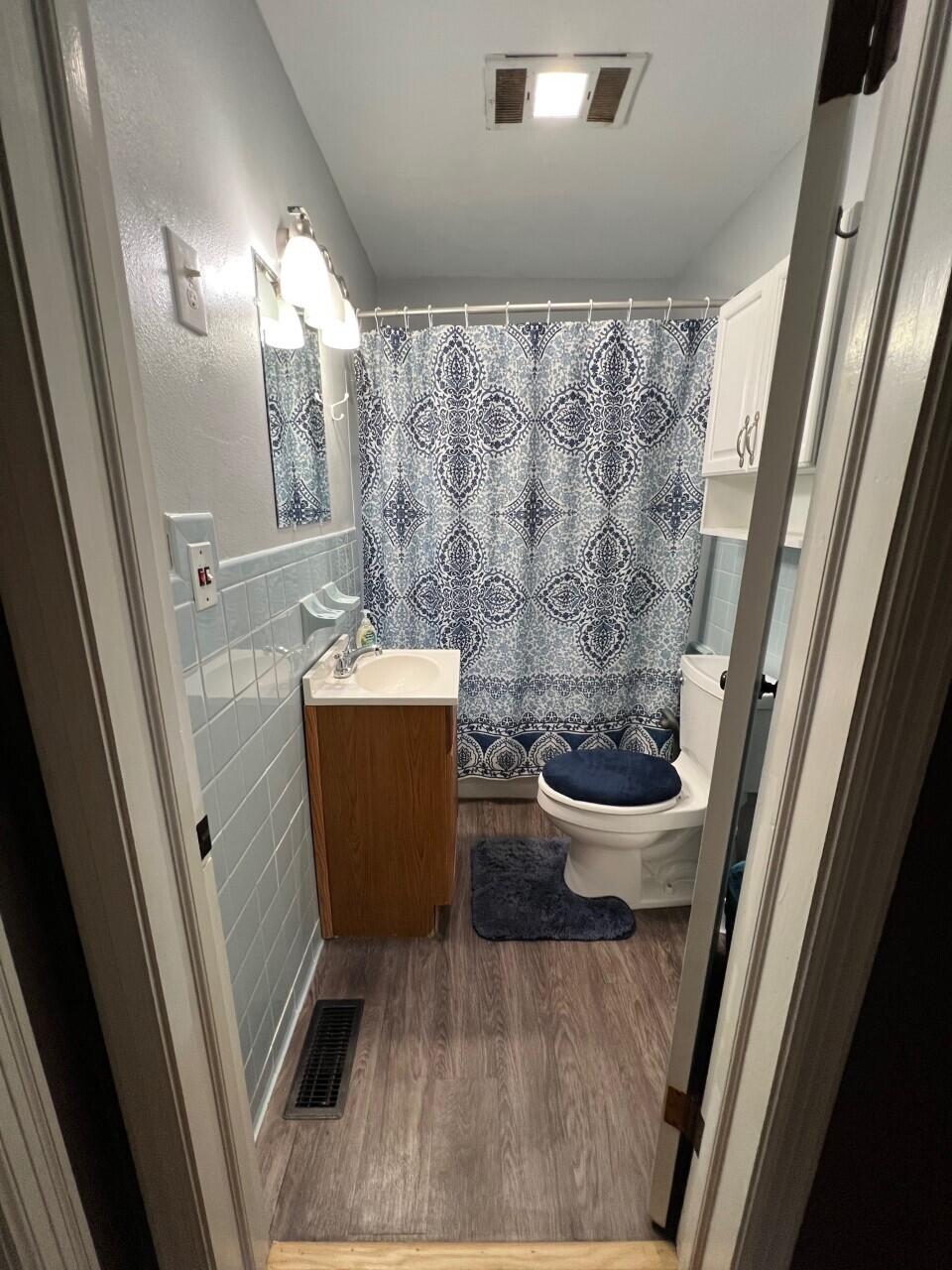 1523 Bore Auger Road Blue Ridge, VA 24064 - Photo 16 of 34 a bathroom with a sink and a mirror