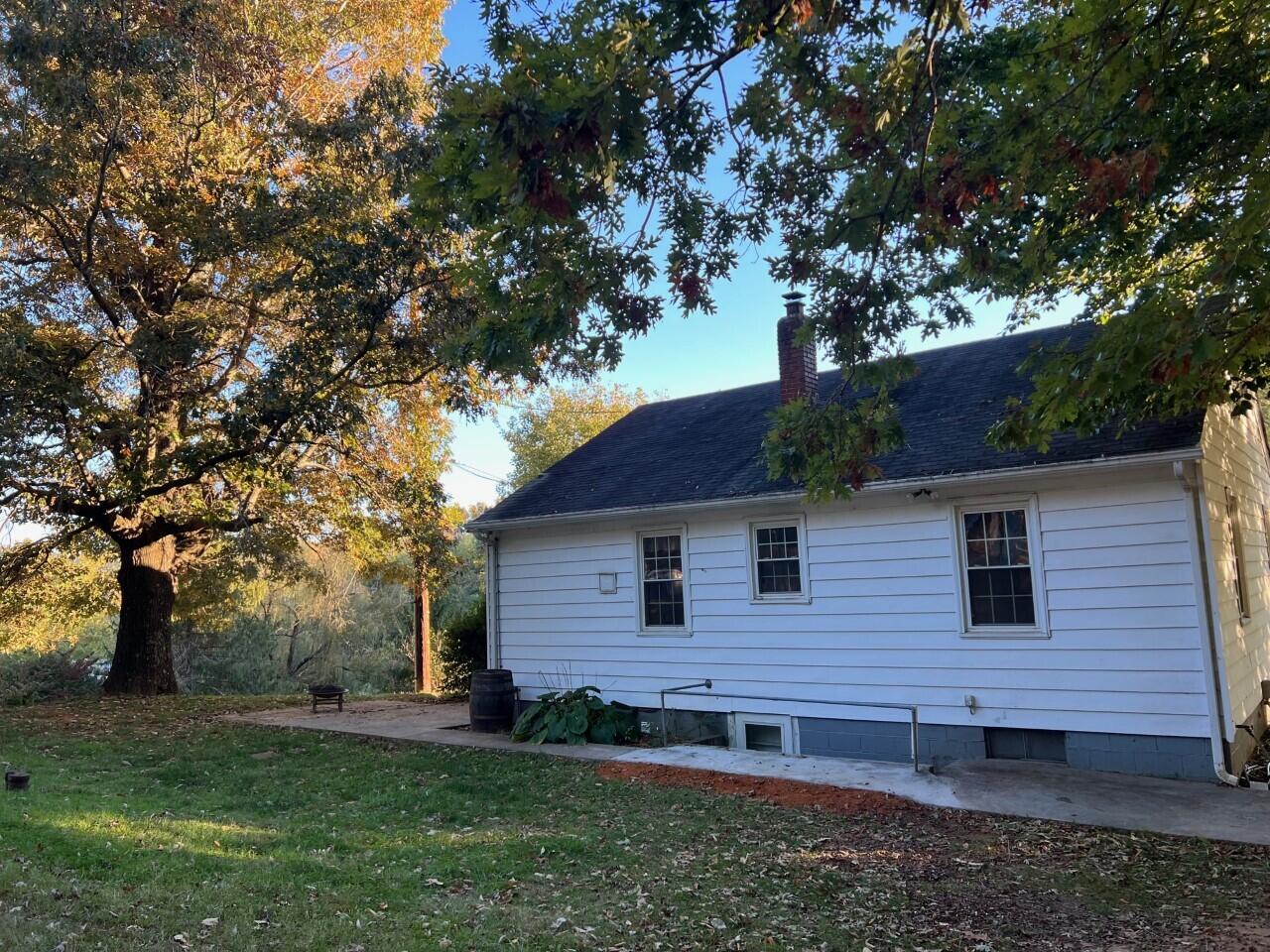 1523 Bore Auger Road Blue Ridge, VA 24064 - Photo 20 of 34 a view of front of a house with a yard