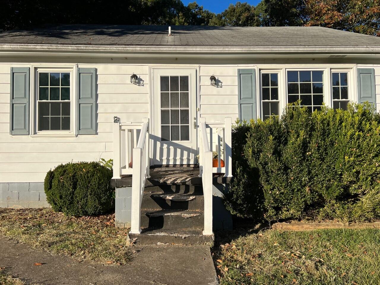 1523 Bore Auger Road Blue Ridge, VA 24064 - Photo 2 of 34 a view of a house with a small yard and plants