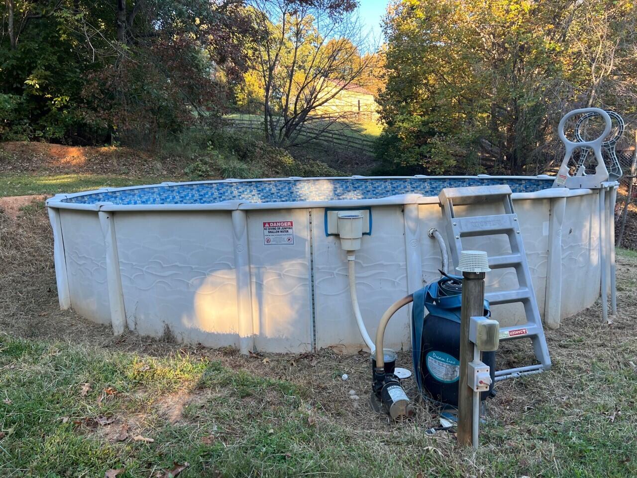 1523 Bore Auger Road Blue Ridge, VA 24064 - Photo 30 of 34 a view of a chair and table in the backyard