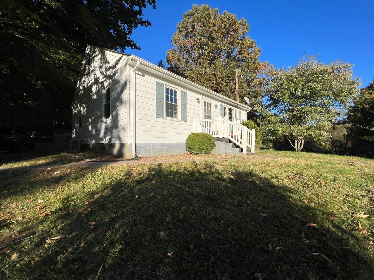 1523 Bore Auger Road Blue Ridge, VA 24064 - Photo 3 of 34 a view of a house with a yard