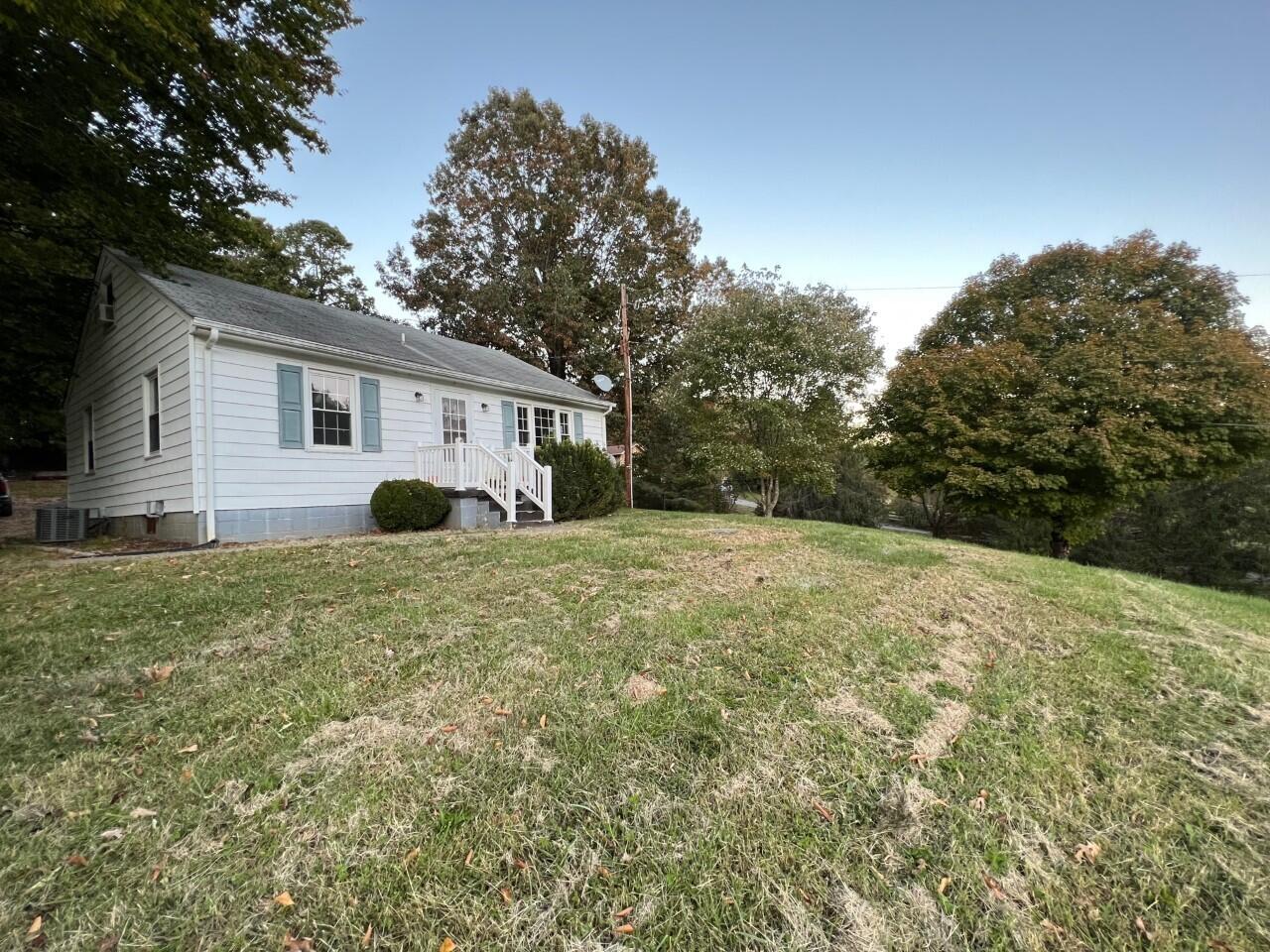 1523 Bore Auger Road Blue Ridge, VA 24064 - Photo 33 of 34 a view of a house with a backyard