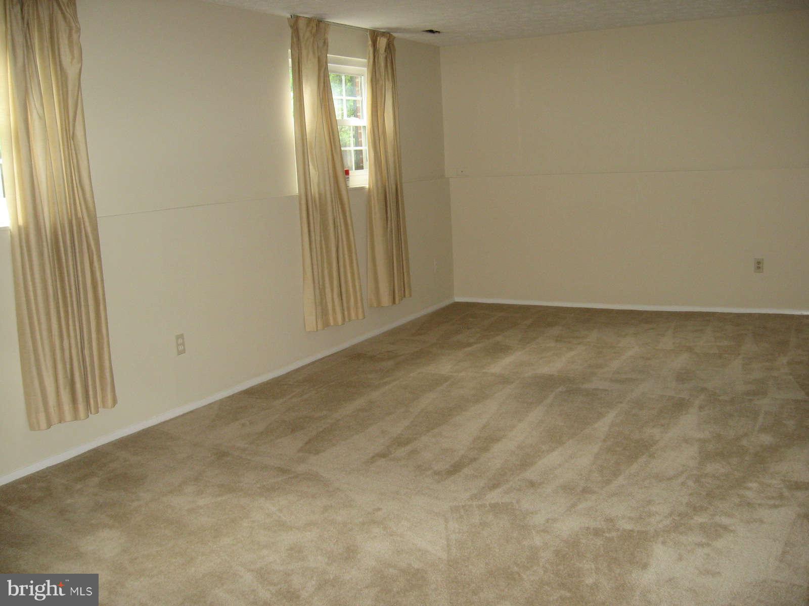 4532 Ambermill Road Baltimore, MD 21236 - Photo 21 of 25 Large LL family room with lots of natural light