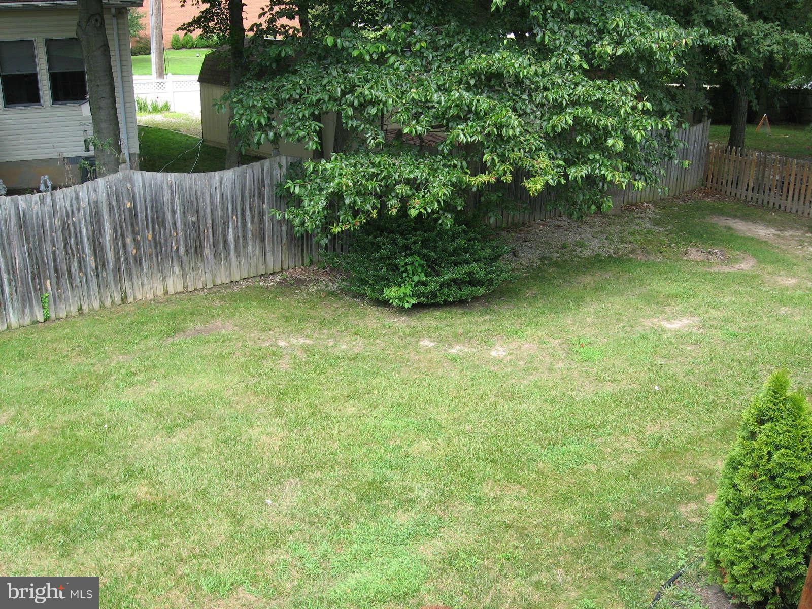 4532 Ambermill Road Baltimore, MD 21236 - Photo 4 of 25 Yard is partially fenced