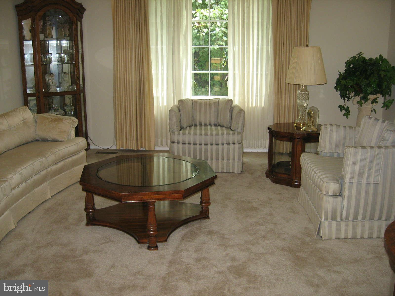 4532 Ambermill Road Baltimore, MD 21236 - Photo 6 of 25 Living room has lots of natural light