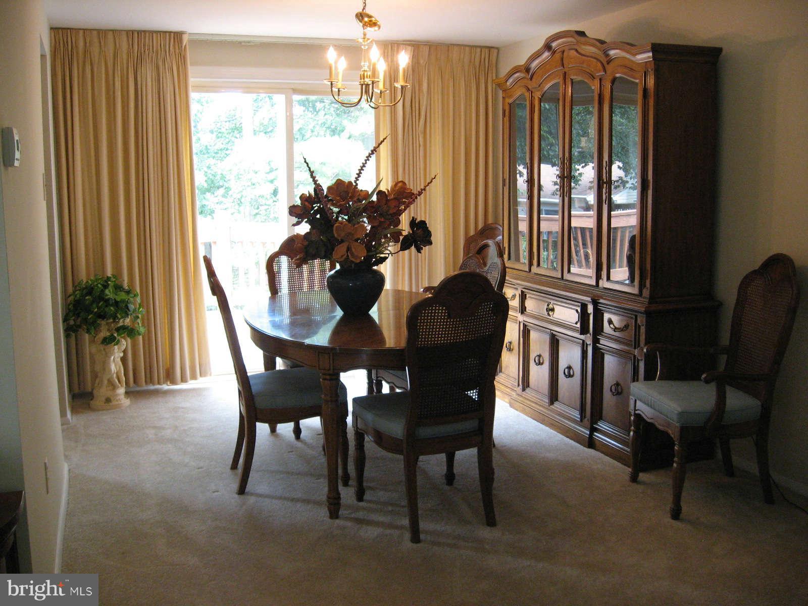4532 Ambermill Road Baltimore, MD 21236 - Photo 7 of 25 Dining room with sliders to rear deck