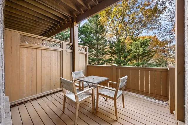 a view of backyard with a patio and wooden floor