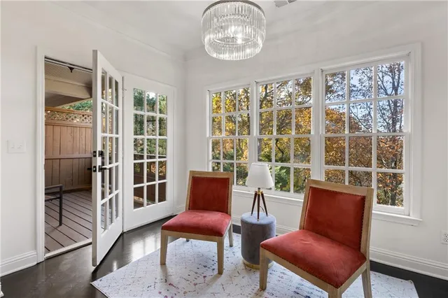 a view of a balcony with wooden floor