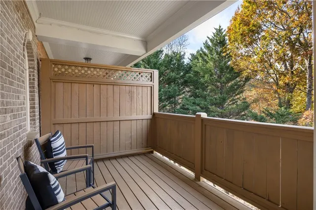 a bed room with a bed and a television