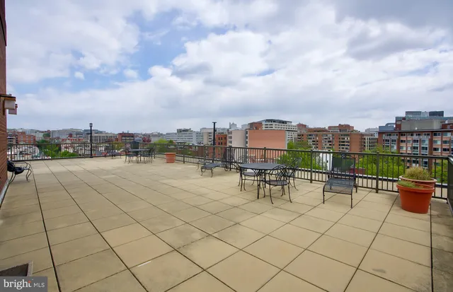 a view of a terrace with sitting area