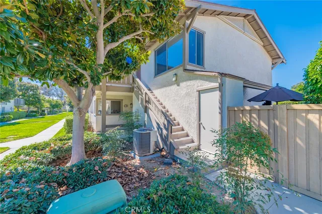 a house view with a outdoor space