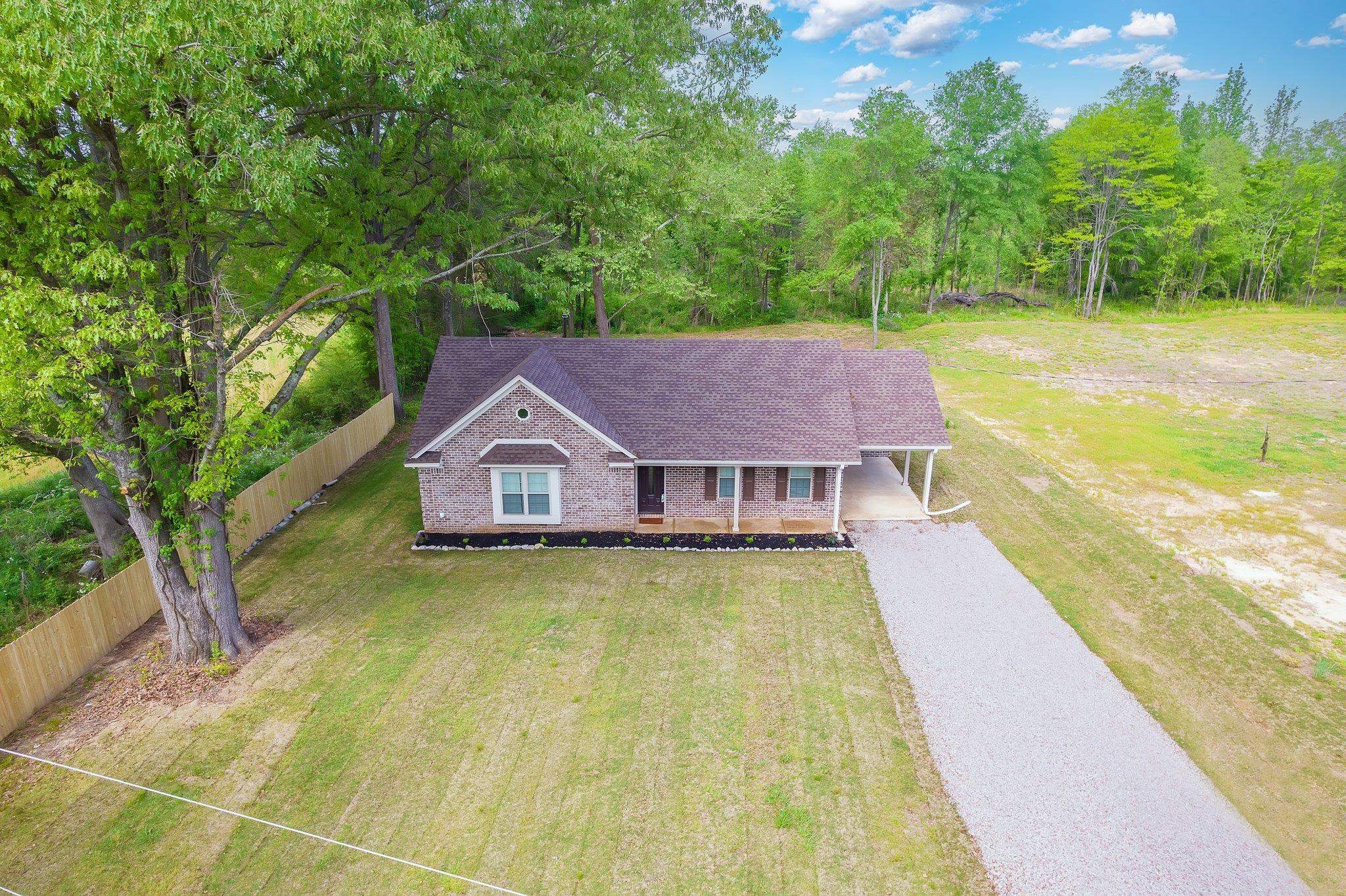 461 Summit Lane Stanton, TN 38069 - Photo 19 of 30 a view of a house with pool and a yard