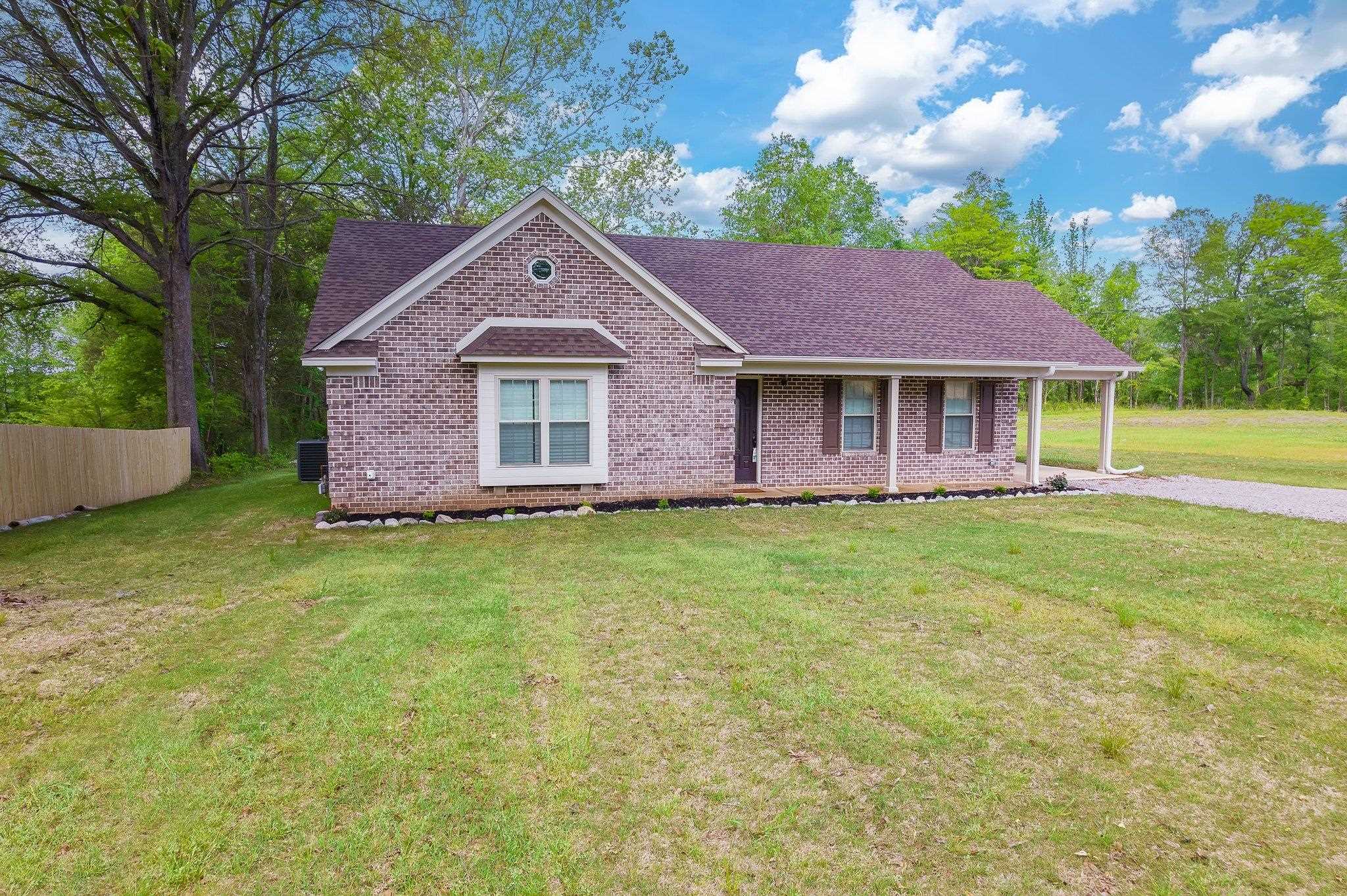 461 Summit Lane Stanton, TN 38069 - Photo 20 of 30 a front view of a house with garden