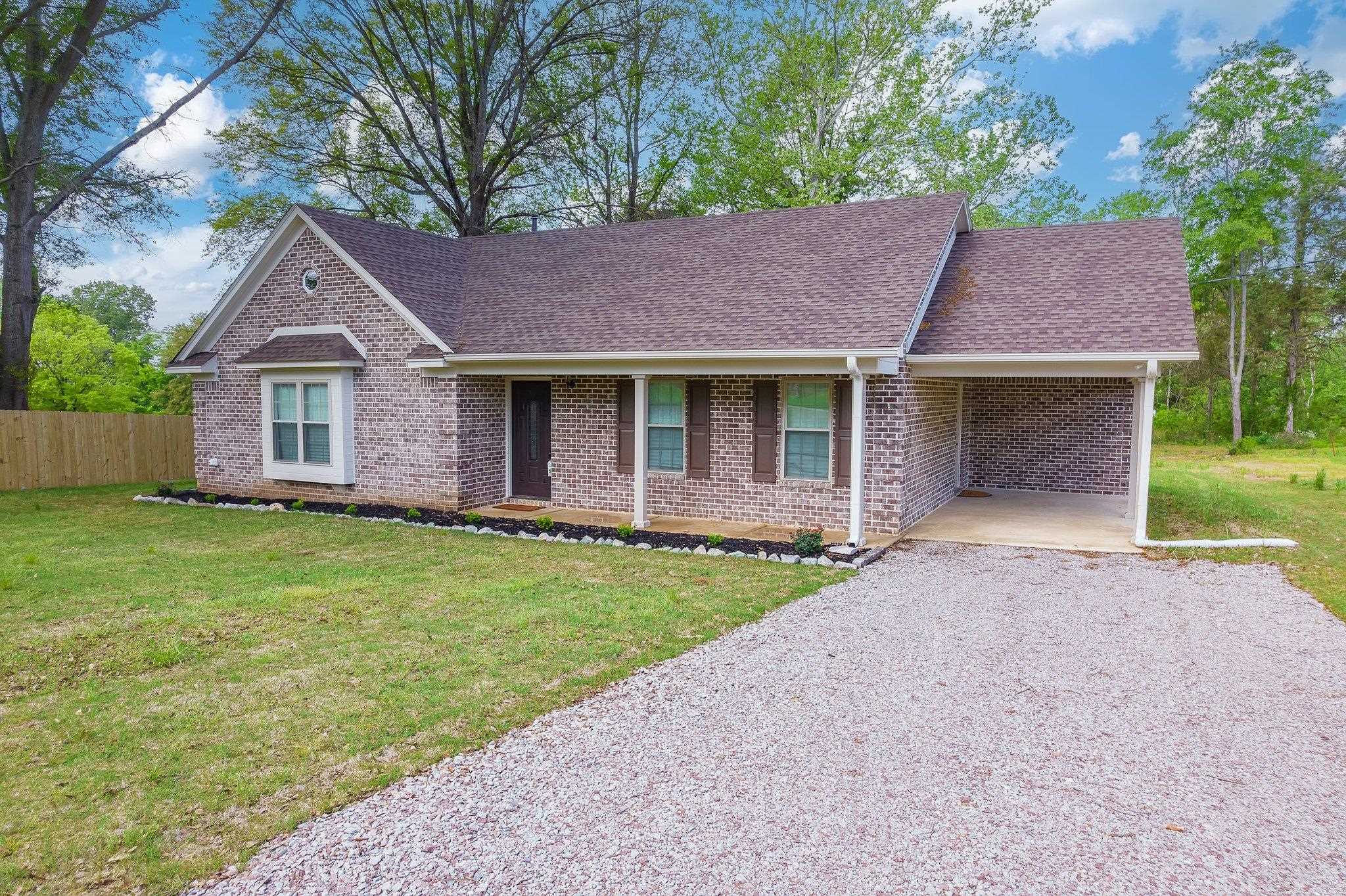 461 Summit Lane Stanton, TN 38069 - Photo 2 of 30 a house with garden in front of it