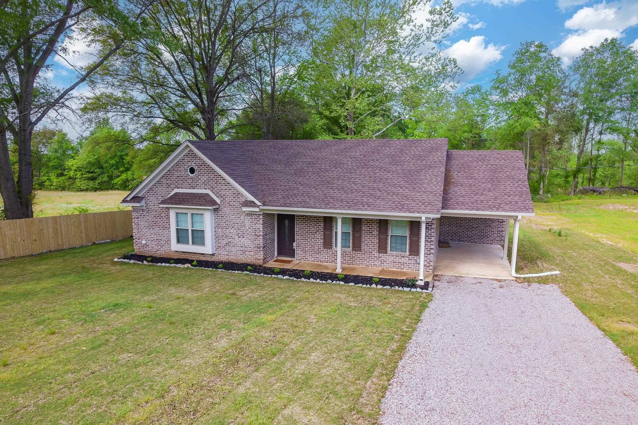 461 Summit Lane Stanton, TN 38069 - Photo 21 of 30 a front view of a house with garden