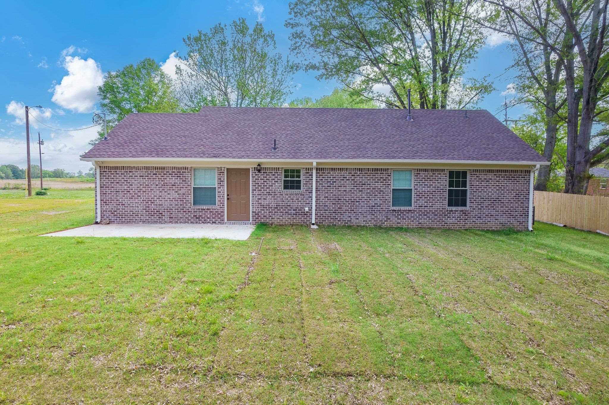 461 Summit Lane Stanton, TN 38069 - Photo 22 of 30 a front view of a house with a garden