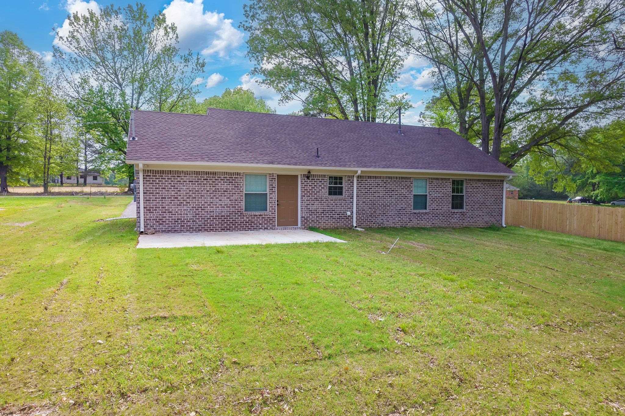 461 Summit Lane Stanton, TN 38069 - Photo 26 of 30 a view of a house with a yard