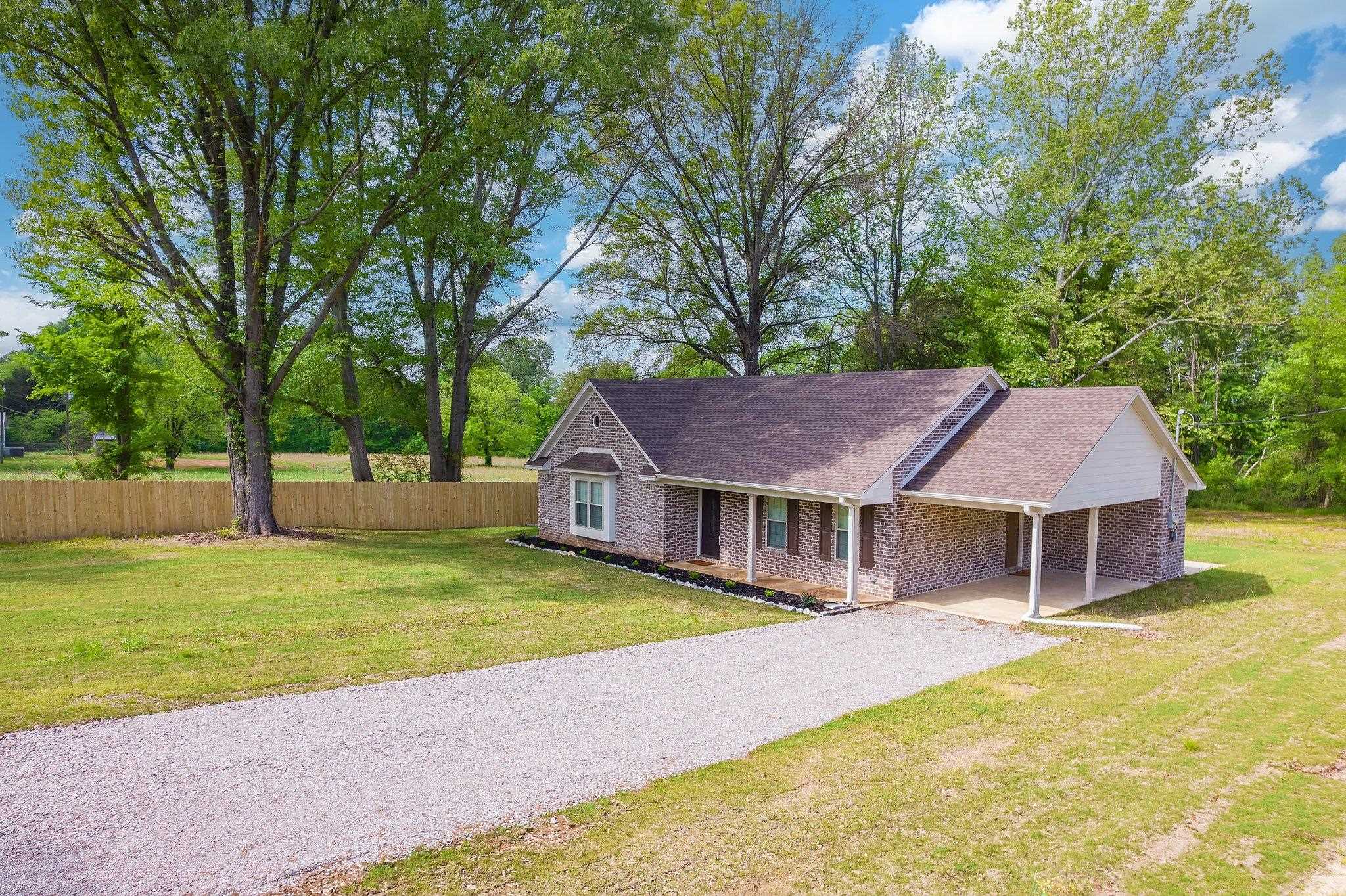 461 Summit Lane Stanton, TN 38069 - Photo 30 of 30 a house with swimming pool in front of it