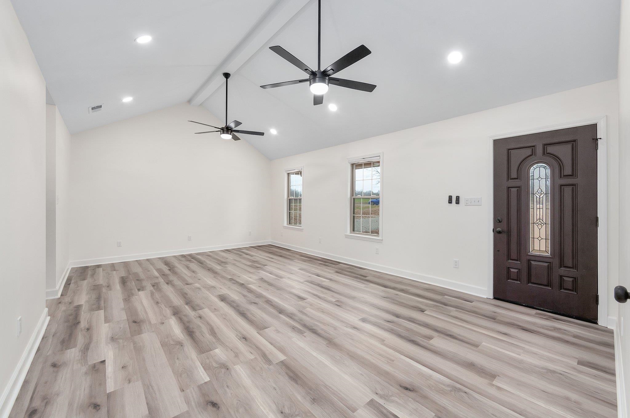 461 Summit Lane Stanton, TN 38069 - Photo 8 of 30 wooden floor in an empty room with a window