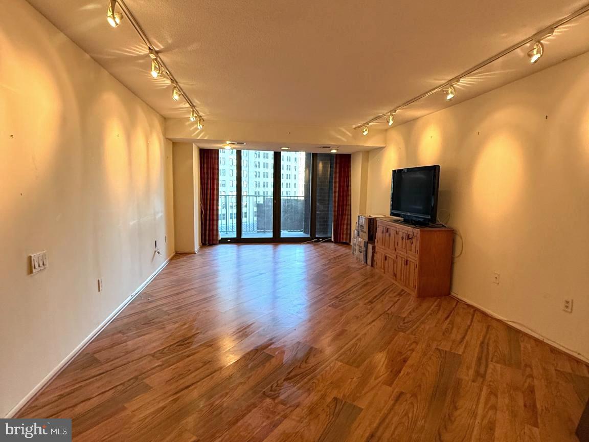1420 Locust Street, Unit 11K Philadelphia, PA 19102 - Photo 4 of 11 Spacious living area with city views.