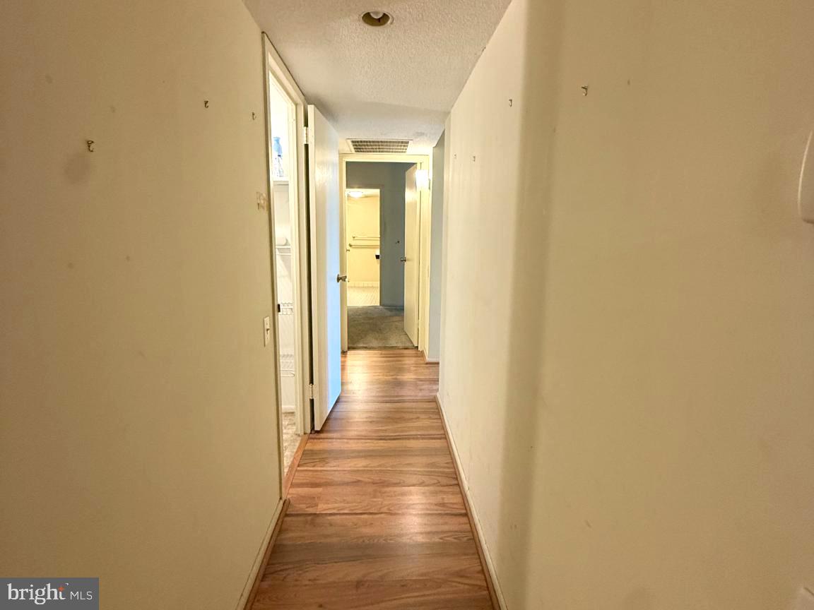 1420 Locust Street, Unit 11K Philadelphia, PA 19102 - Photo 8 of 11 Inviting hallway with warm tones.