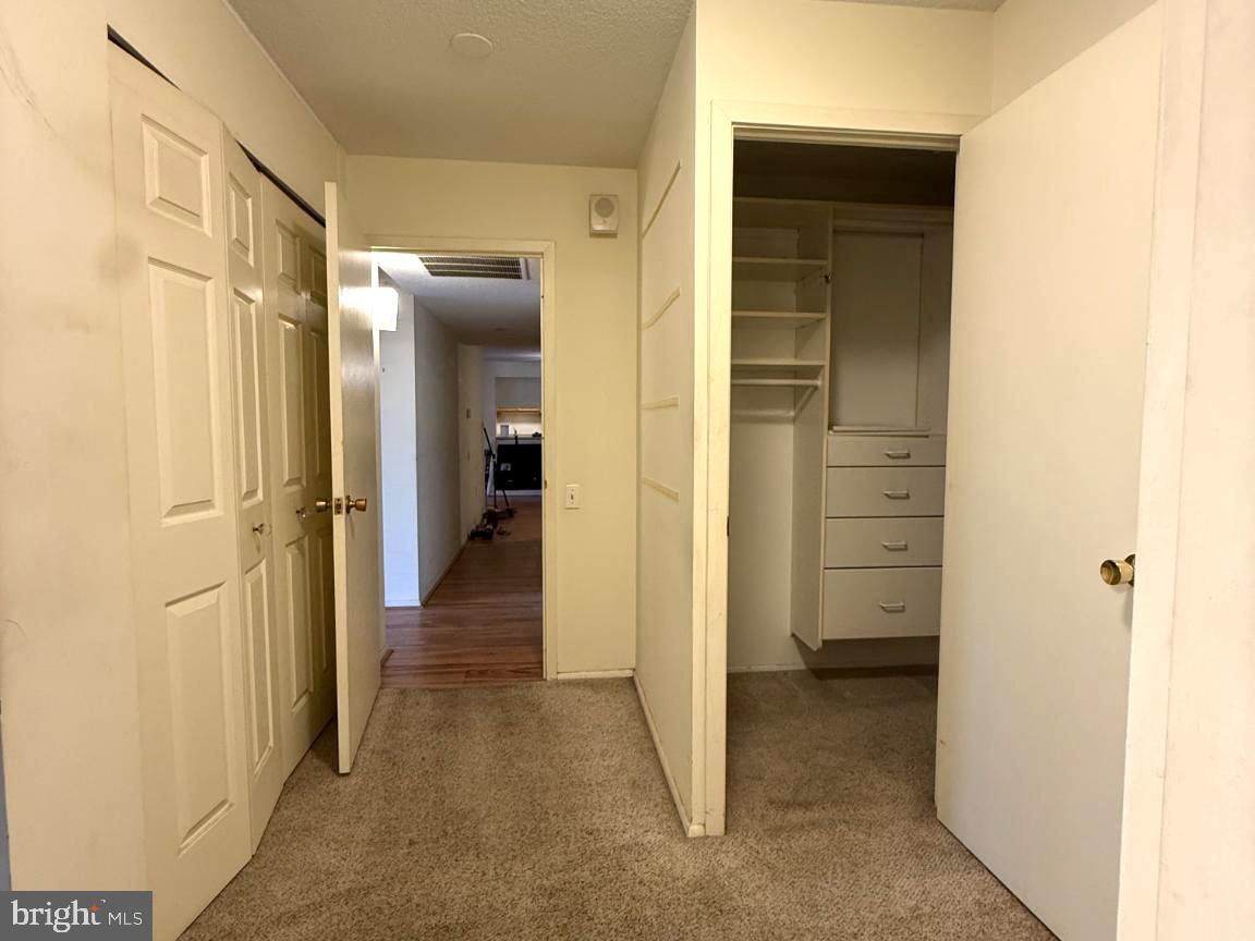 1420 Locust Street, Unit 11K Philadelphia, PA 19102 - Photo 10 of 11 Spacious hallway with closet access.