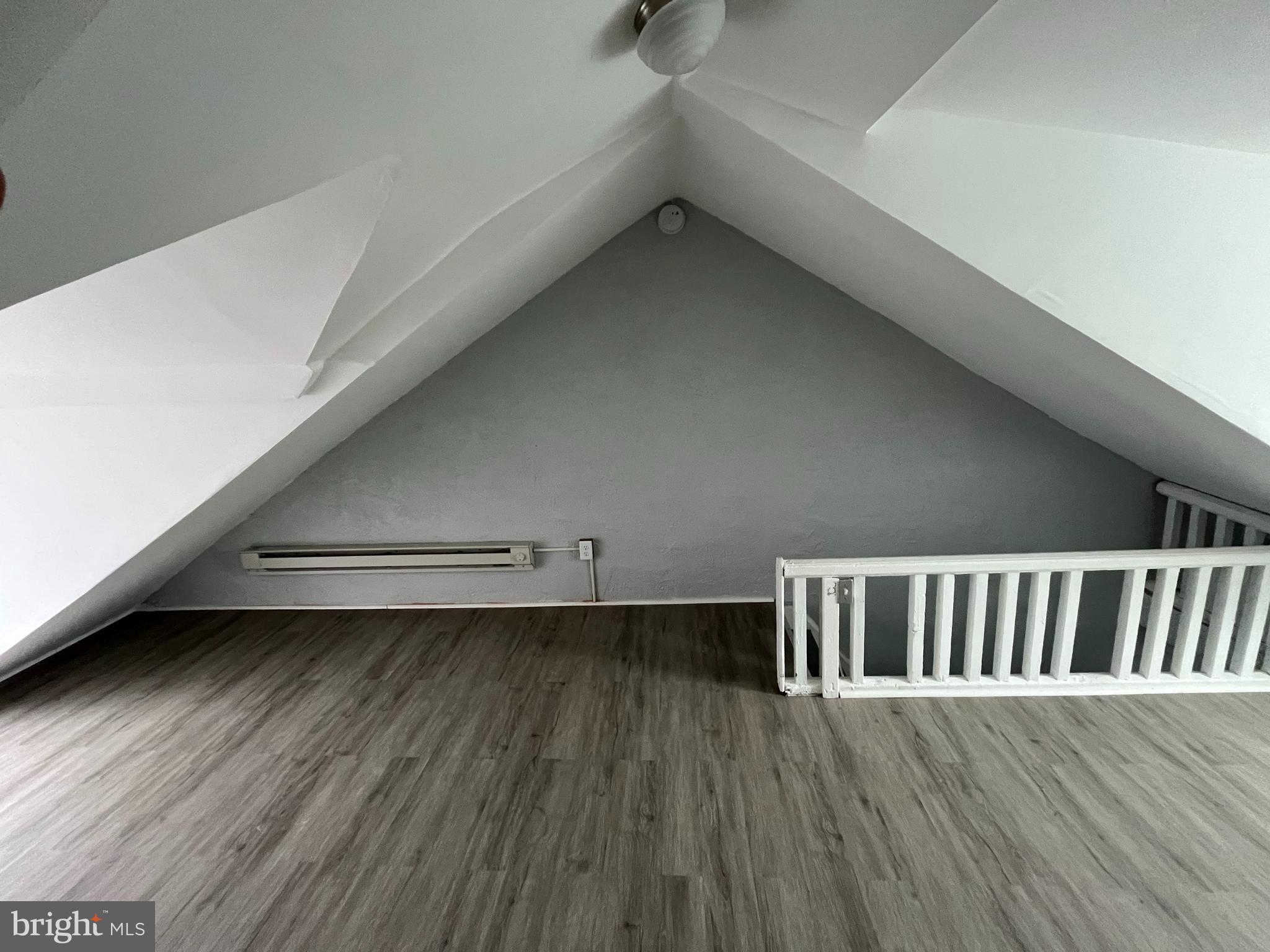 518 Johnson Street Reading, PA 19601 - Photo 5 of 5 a view of a room with wooden floor