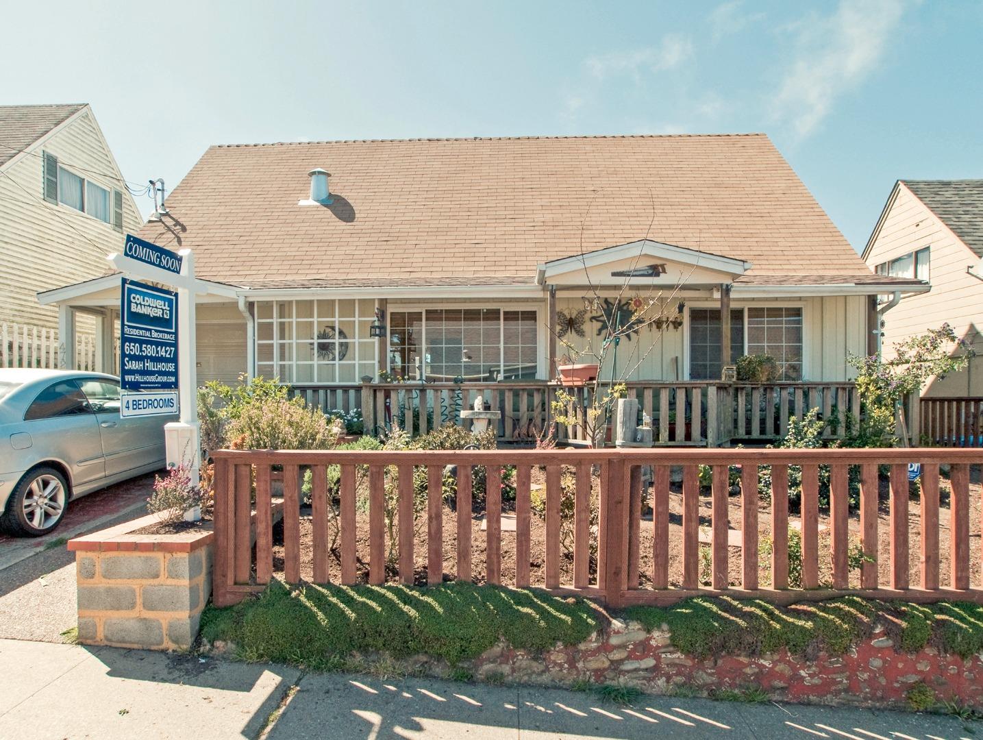 front view of a house with a deck