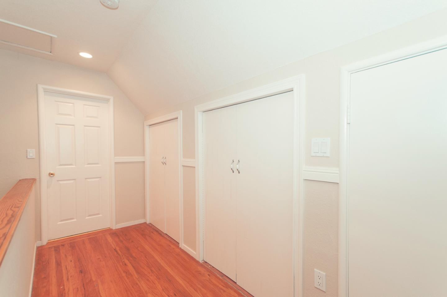 472 Inverness Drive Pacifica, CA 94044 - Photo 17 of 22 a view of a room with wooden floor