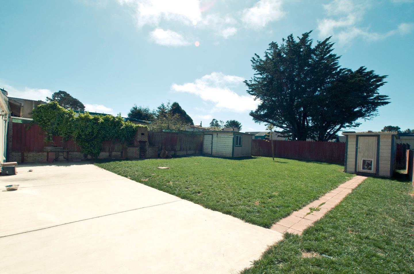 472 Inverness Drive Pacifica, CA 94044 - Photo 20 of 22 a view of a backyard with green space