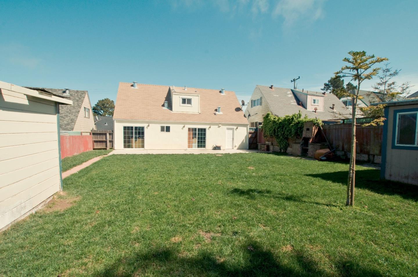 472 Inverness Drive Pacifica, CA 94044 - Photo 2 of 22 a house view with a garden space
