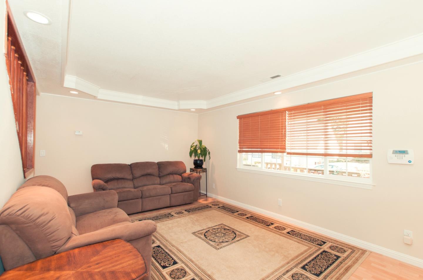 472 Inverness Drive Pacifica, CA 94044 - Photo 6 of 22 a living room with furniture and a window