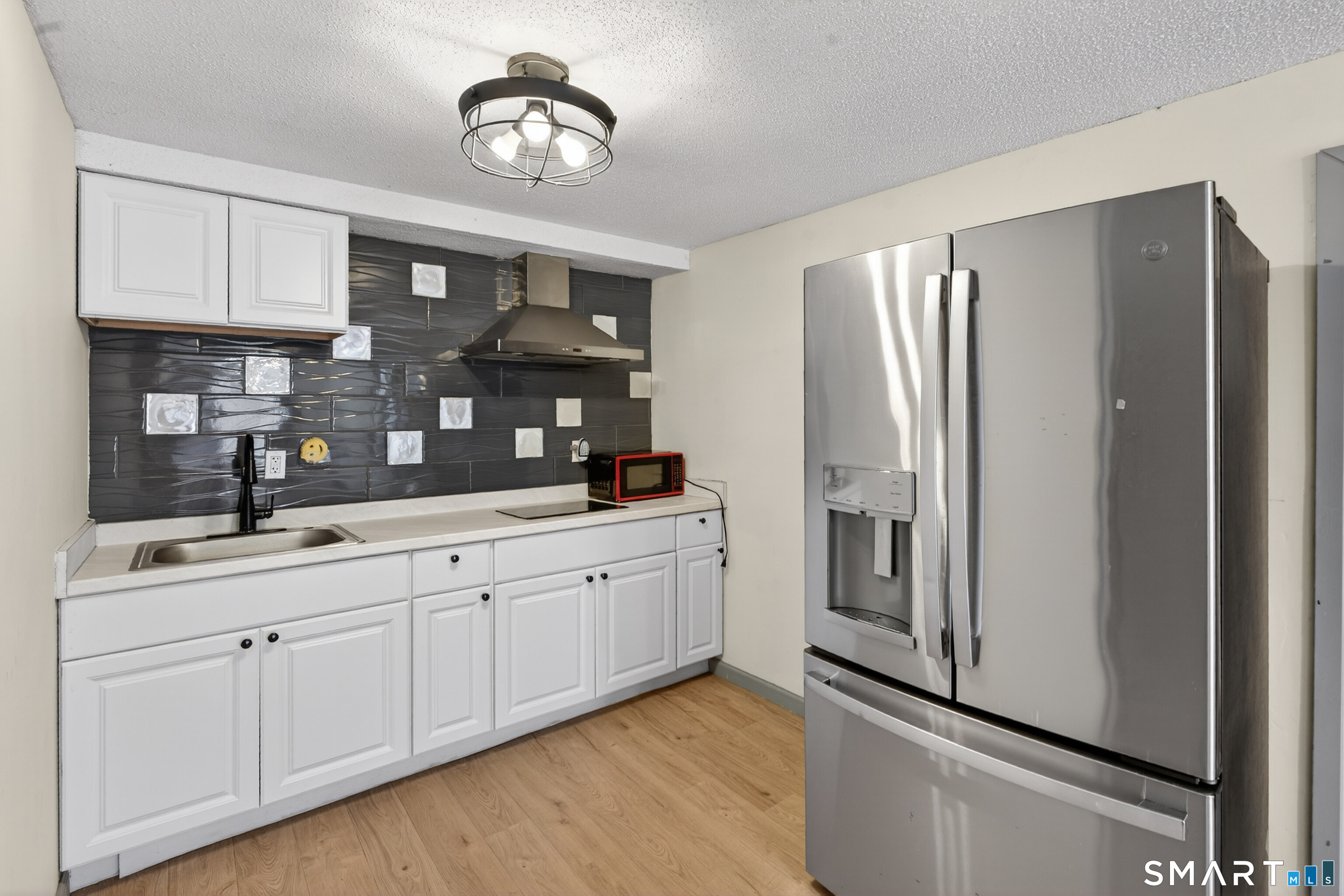 120 East Hampton Road Marlborough, CT 06447 - Photo 20 of 28 In-law - walk out to driveway