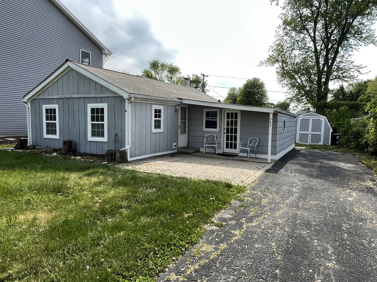 3S564 Virginia Avenue Warrenville, IL 60555 - Photo 1 of 14 a house with trees in the background